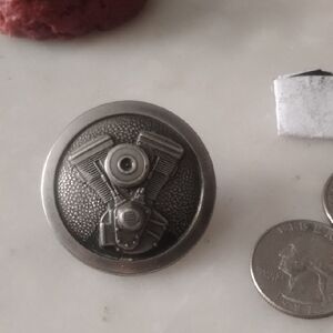 Metal Medallion Featuring A Harley-Davidson Motorcycle Engine Design